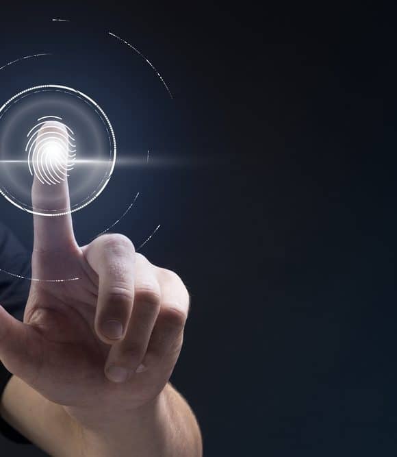 Biometric technology background with fingerprint scanning system DPO e LGPD: entenda a importância da área para evitar riscos jurídicos